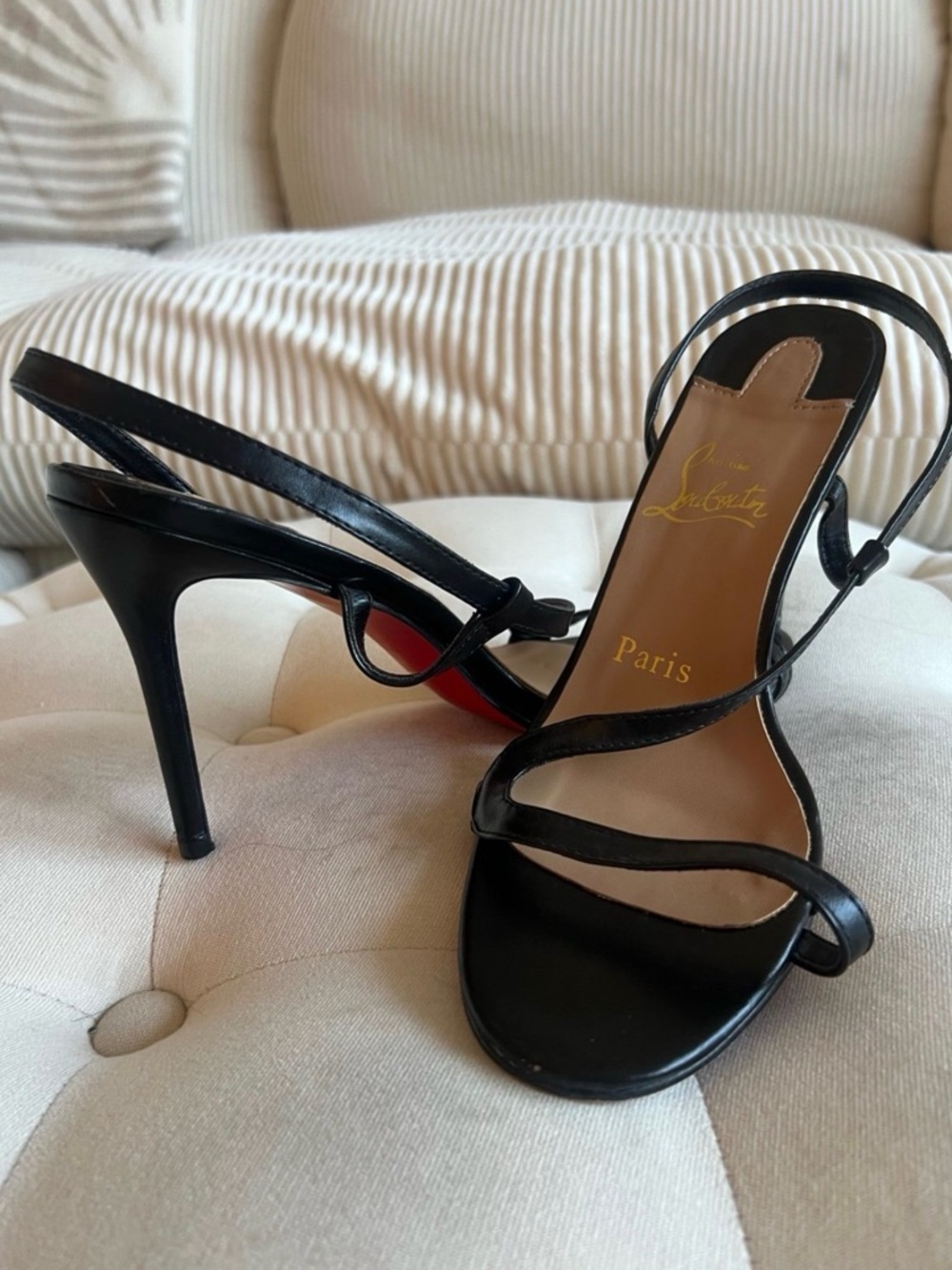 Christian Louboutin - Rosalie 100
Black Leather Strappy Slingbacks